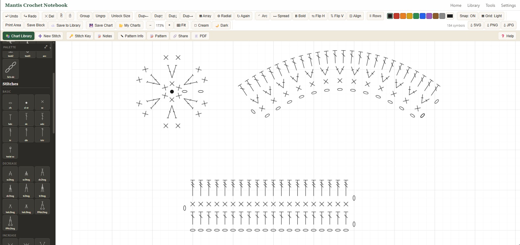 A crochet symbol chart built in the editor: a radial motif, a curved fan, and a flat swatch
