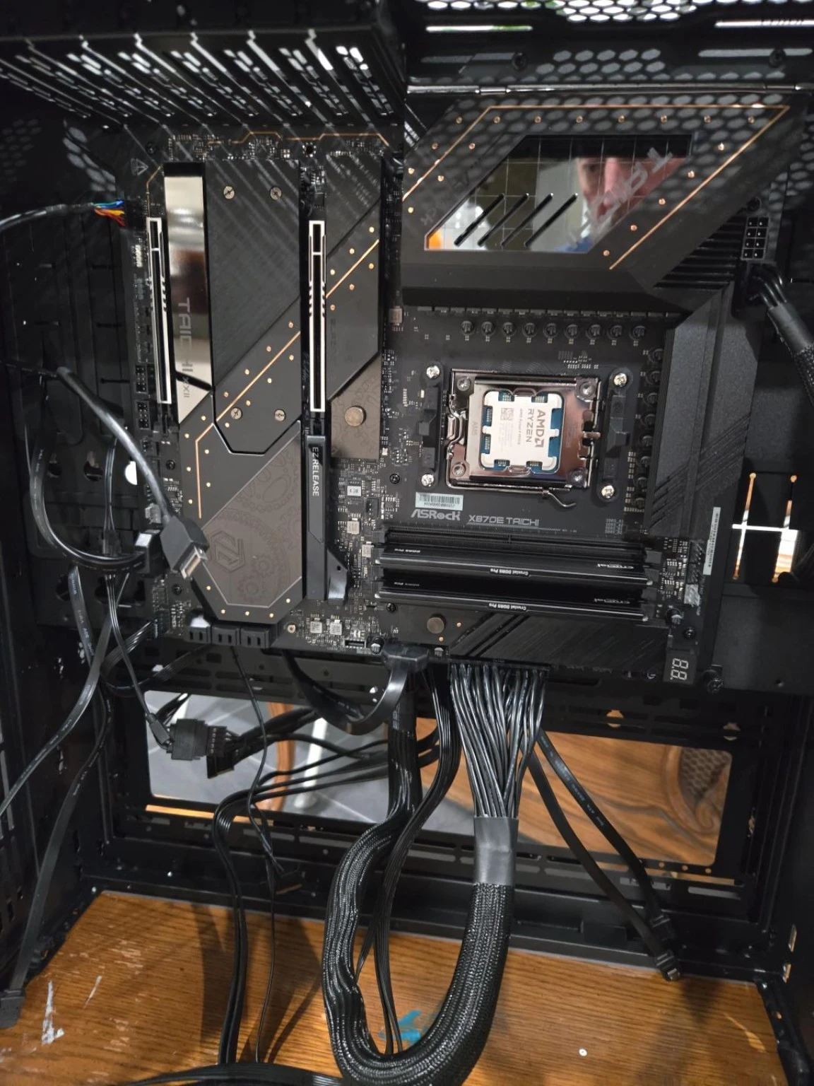 My local AI workstation during assembly, with the motherboard and processor installed in the case
